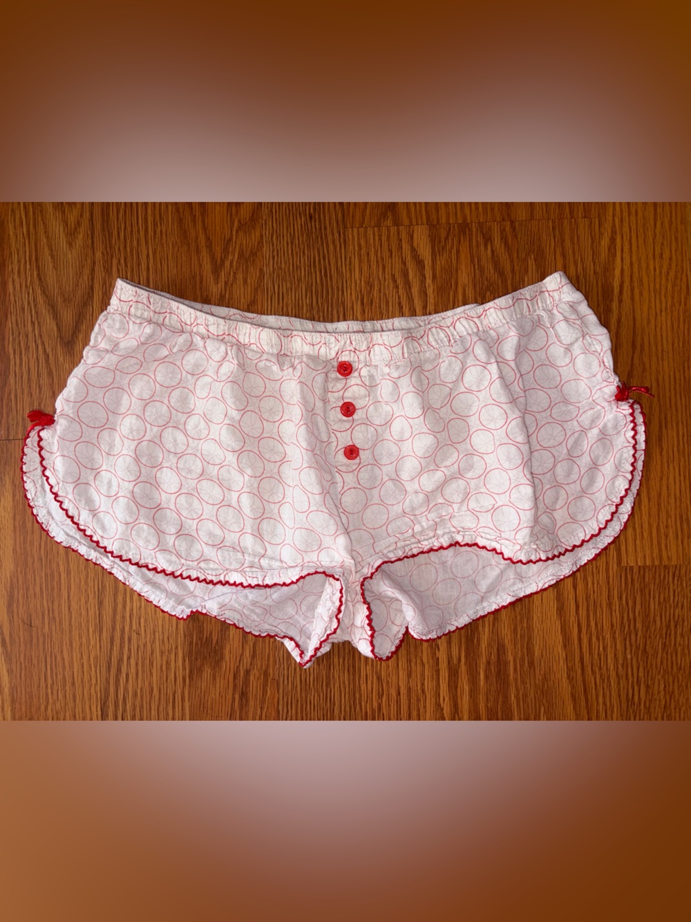 Rampage White low-waist shorts with Red Circle Print and Red Trim Accents